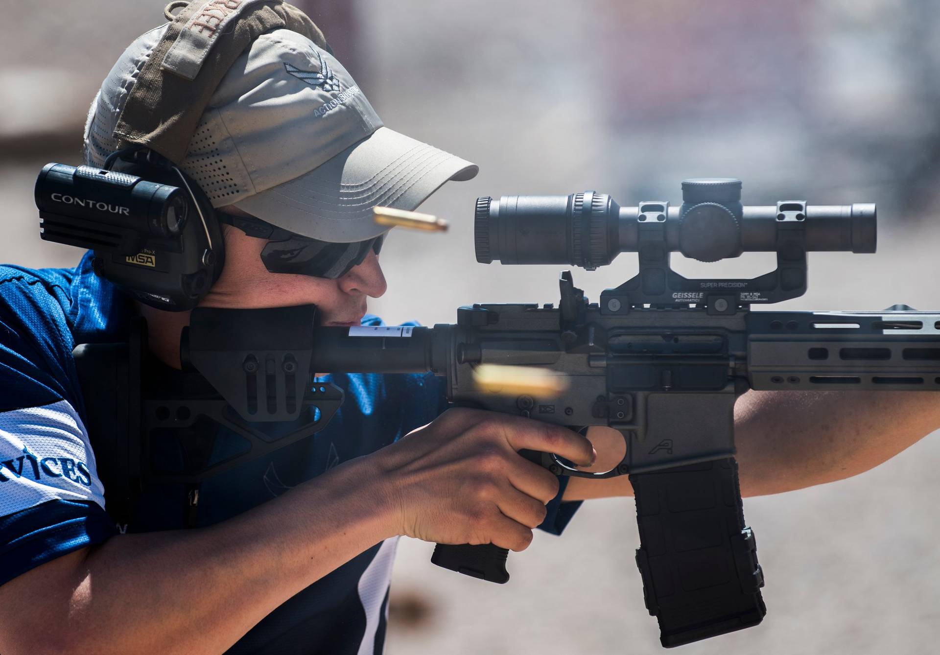 Competitive rifle athlete on a shooting stage